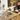 Paper mache brass bowl collection styled in an interior, view 6