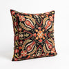 Suzani Pillow - Black Paisley Medallion, hand embroidered Uzbek suzani pillow seen at an angle