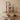 African Namji dolls styled in a modern interior — handmade Cameroon beaded decor